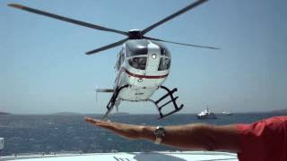 preview picture of video 'Eurocopter EC 135 Landing on yacht, Antiparos, Greece'