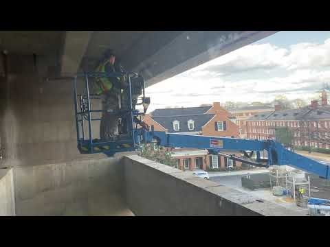Operando un telescopic Boom lift ( genie zx-135/70