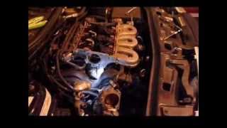 Saturn vue  2002  3.0 v-6 Thermostat removal,  Intake,  valve cover gaskets  and spark plugs