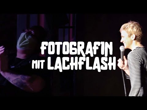 Fotografin mit Lachflash