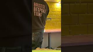 Preview of Part of the installation using the Aldgate Yellow Metro tile from Walls and Floors, and the finish.