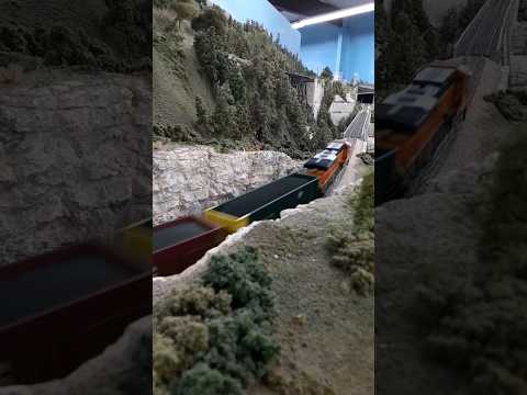 A BNSF coal train crosses the mainline steel bridge SAMRA #trains #modelrailroad #sanantonio #bnsf