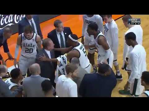 Tom Izzo restrained while berating Aaron Henry