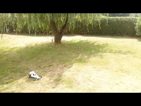 Grasshopper with RC10 front suspension and 5 link rear motor test