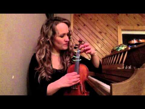 Putting tapes on Violin