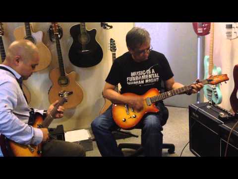 Wally Gonzalez and Daniel Crisologo Jam D&D Custom Guitars