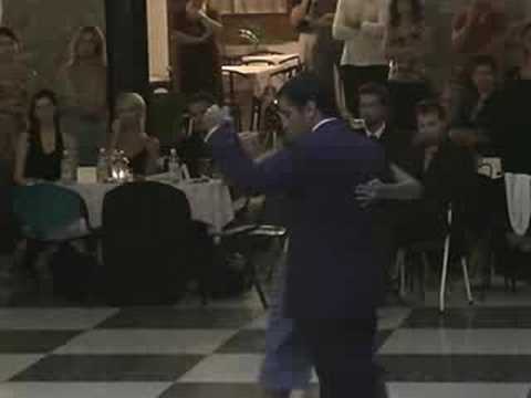  Roxana Suarez  and  Sebastian Achaval  are  dancing  to  the  tango  "  Abandono  "