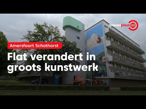 Kunstenaar JanIsDeMan aan het werk in Amersfoort Schothorst.