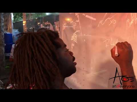 Watch R.LUM.R Add to Our Mural at Lollapalooza!