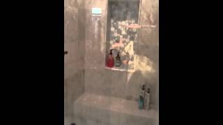 Travertine bath remodel with no curb drain Travertine bath remodel with no curb drain