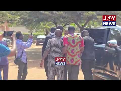 Nana Baffour Awuah and Justice Srem-Sai exchange pleasantries at the court premises.