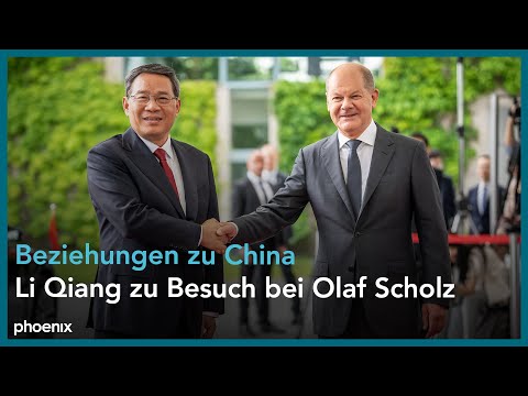 Olaf Scholz (SPD) begrüßt den chinesischen Ministerpräsidenten Li Qiang mit militärischen Ehren
