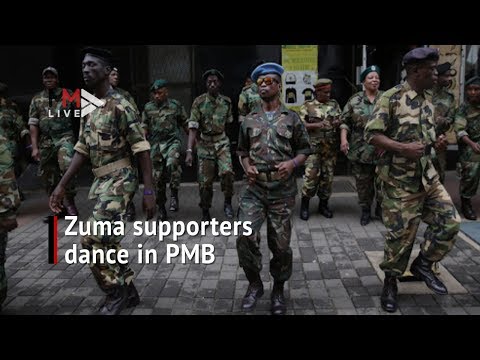 Supporting Zuma MK vets dance in support of Zuma as he appears on corruption charges