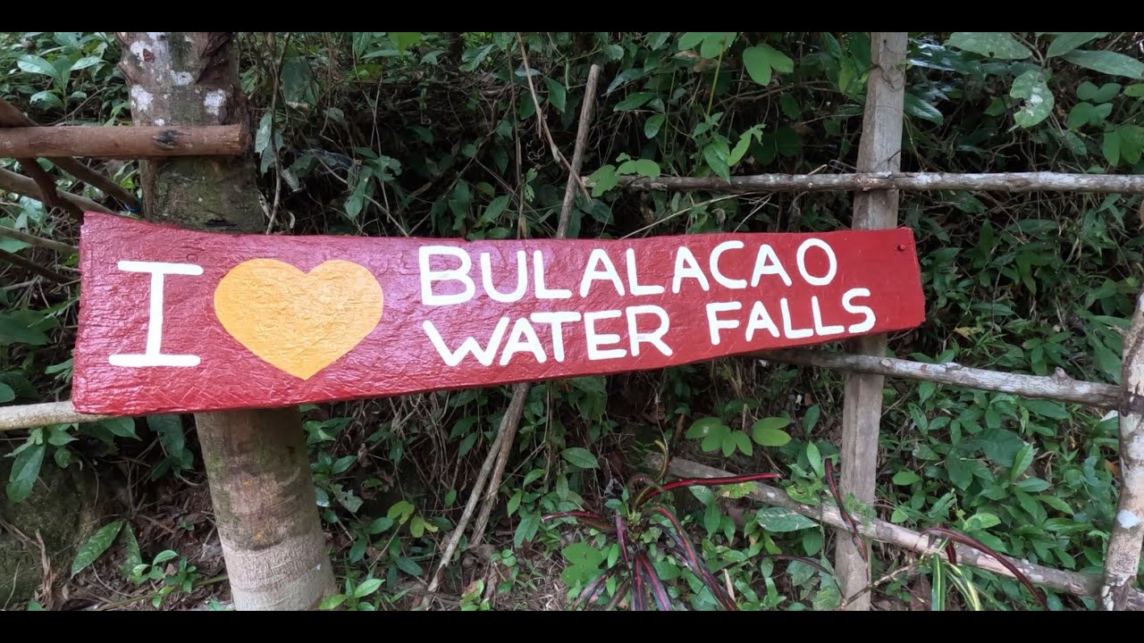 Embark on walking tour to Bulalacao Waterfalls.