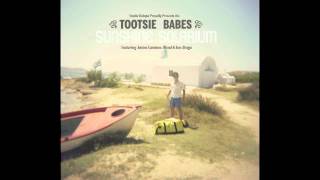 Tootsie Babes-Detras De La Luna(Feat.Tonino Carotone)