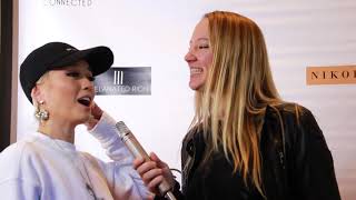 AGNEZ MO talks with Gwenn Wunderlich at Celebrity Connected AMA's. video