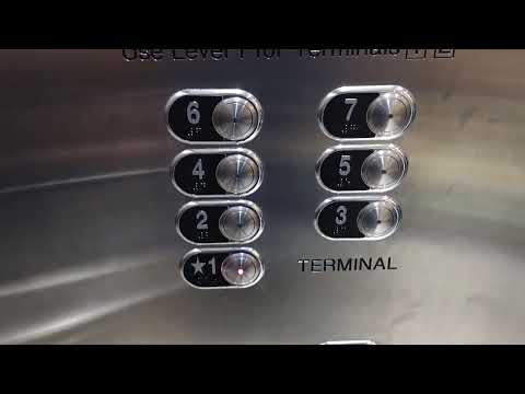 Schindler Mod Traction Purple Elevators at RDU International Airport Parking Garage in Raleigh NC