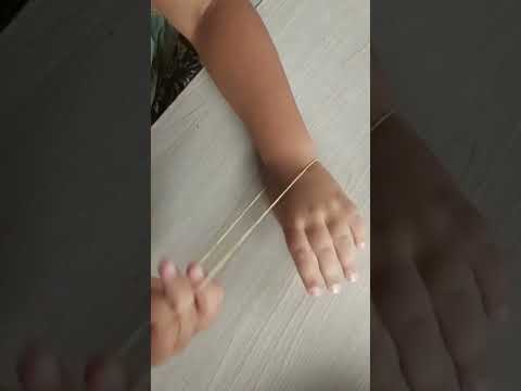 Mágica com elástico