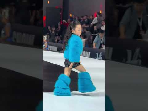 Sassy girl shows off her catwalk skills