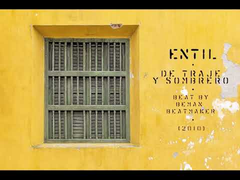 Entíl - De traje y sombrero