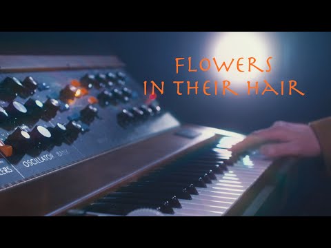 'Flowers in their hair' ft Valerie Etienne (Official Video)
