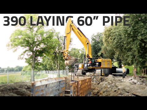 Laying 60" Pipe with a CAT 390