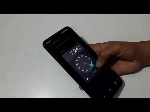 How to change date and time in Motorola E7 change date and time