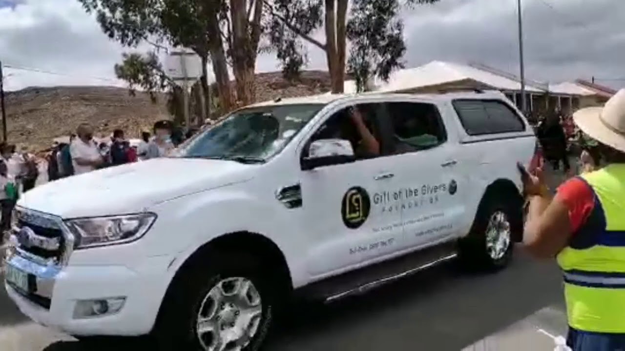 Gift of The Givers Donating Food Parcels to The Community Of Touws River