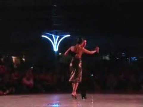  Miguel Angel Zotto  and  Daiana Guspero  are  dancing  to  the  tango  "  Tigre Viejo  "