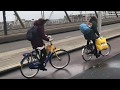 Afzien op de Erasmusbrug bij storm Dennis
