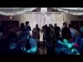 Los Angeles DJ Roman with wedding reception guests dancing shout