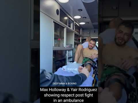 Max Holloway & Yair Rodriguez showing respect post fight in an ambulance