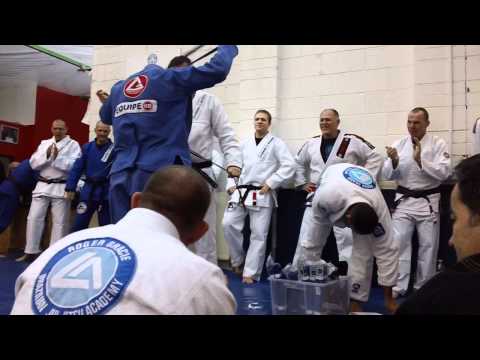 Roger Gracie promotes Dominik Debiec to Brown Belt