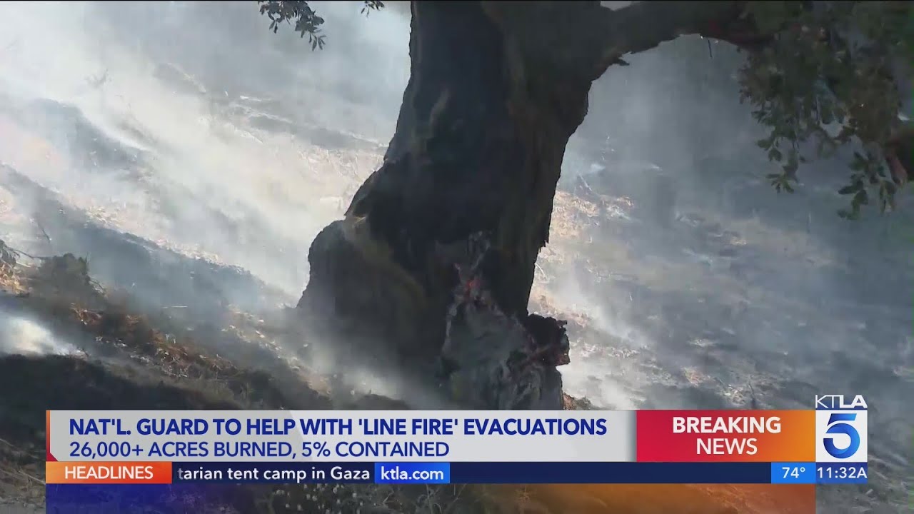 Line fire burns 26,000 acres, threatens 65,000 homes in San Bernardino County