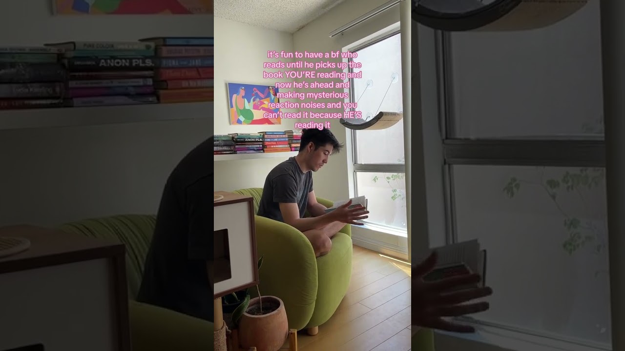 sitting in MY reading corner reading MY book