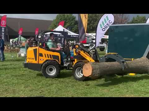 2430 SLT Compact Loader Tree Work Demo at GIE Expo