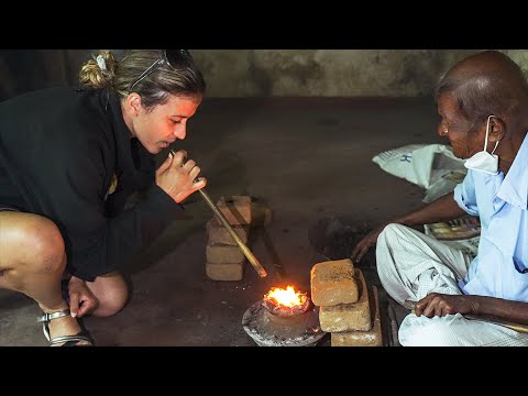 Traditional sapphire heat treatment with blow-pipe and charcoal