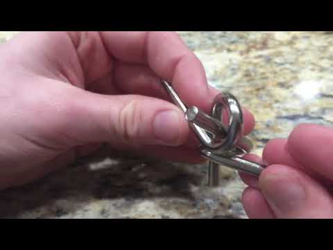 How to solve this hard metal puzzle