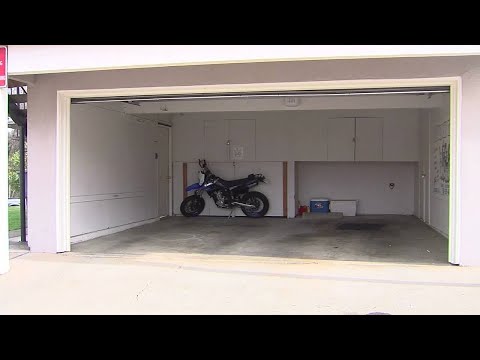 HOA demands homeowners to keep garage doors open