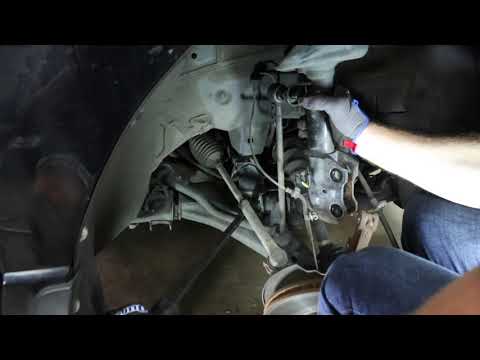 How to Replace Shocks & Struts on a Acura RDX