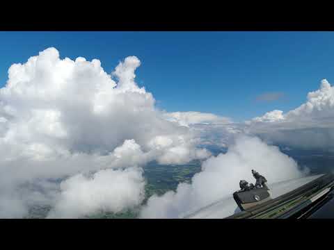 4K Hyperlapse. Eindhoven (EIN/EHEH) arrival while circumnavigating along rainclouds, ILS RWY 21