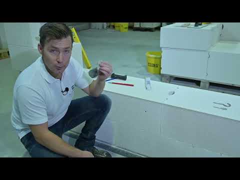 Wie befestigt man einen Dübel in einer Porenbetonwand?