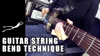 Guitar string bend technique