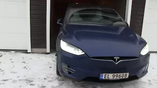 Model X summoning in and out of tight garage