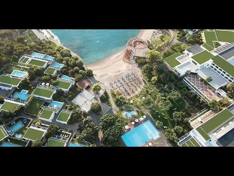 Luftaufnahme des Elounda Bay Palace Hotels mit Swimmingpools und Booten im Wasser.