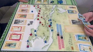 A few Acres of Snow game and player turn in action. CDG game from Tree Frog games.