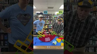 It's Chris vs. Mike in the dexterity game challenge of the century.