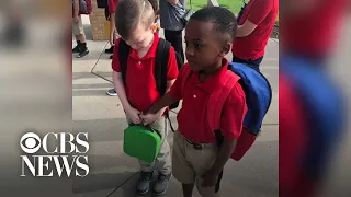 Boy consoles crying classmate with autism on first day of school