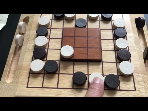 Trinidad. Another wooden abstract, checkers-type game from the early 2000s.