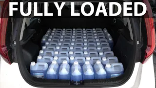 How much range is lost with 400 kg weight in the car?